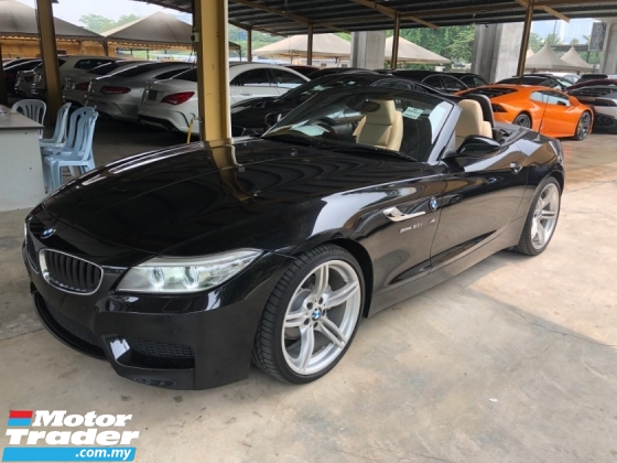 2015 BMW Z4 M Sport sDrive 2.0 Twin-Power-Turbo 8-Speed Convertible Hard Top BMW i-Drive Interface Multi Function Paddle Shift Steering Sport Plus/Eco Pro Dual Climate Control Bi-Xenon Park Assist Reverse Camera Bluetooth Connectivity Unreg